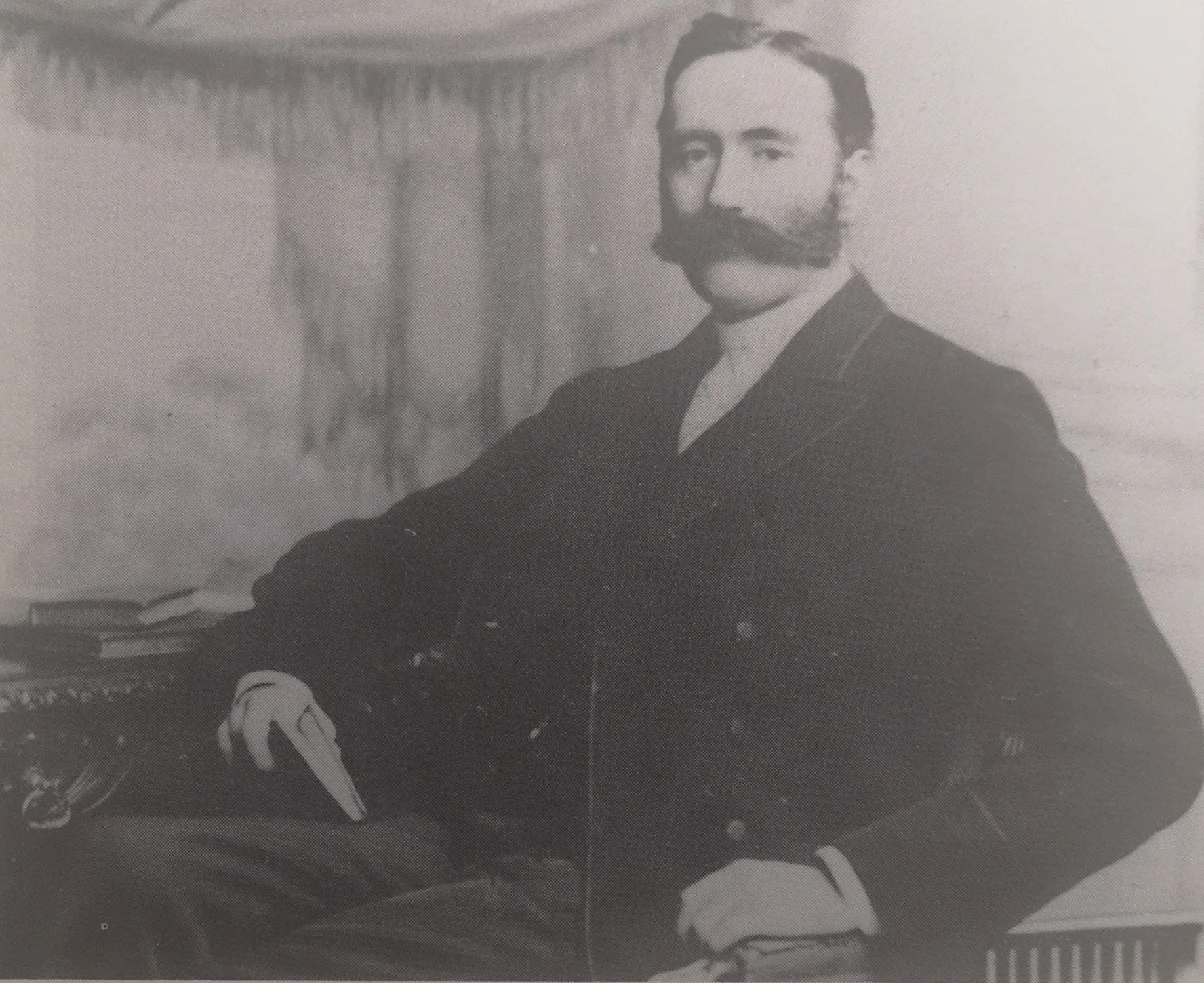 An image of the Hugh D. Brown sitting at a desk